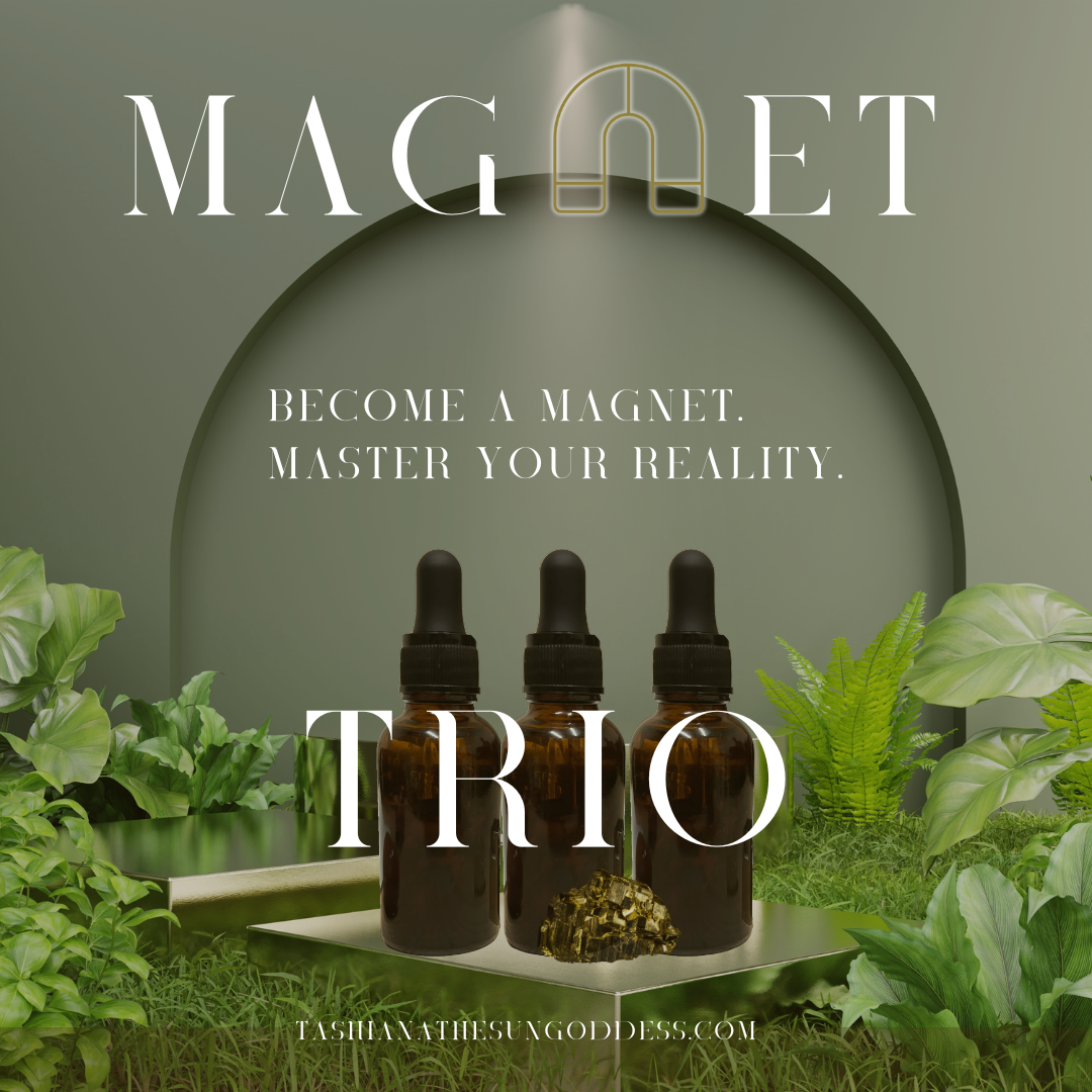 Image of a trio Magnet oil on a pyrite platform with green leaves and grass; made by Tashiana The SunGoddess